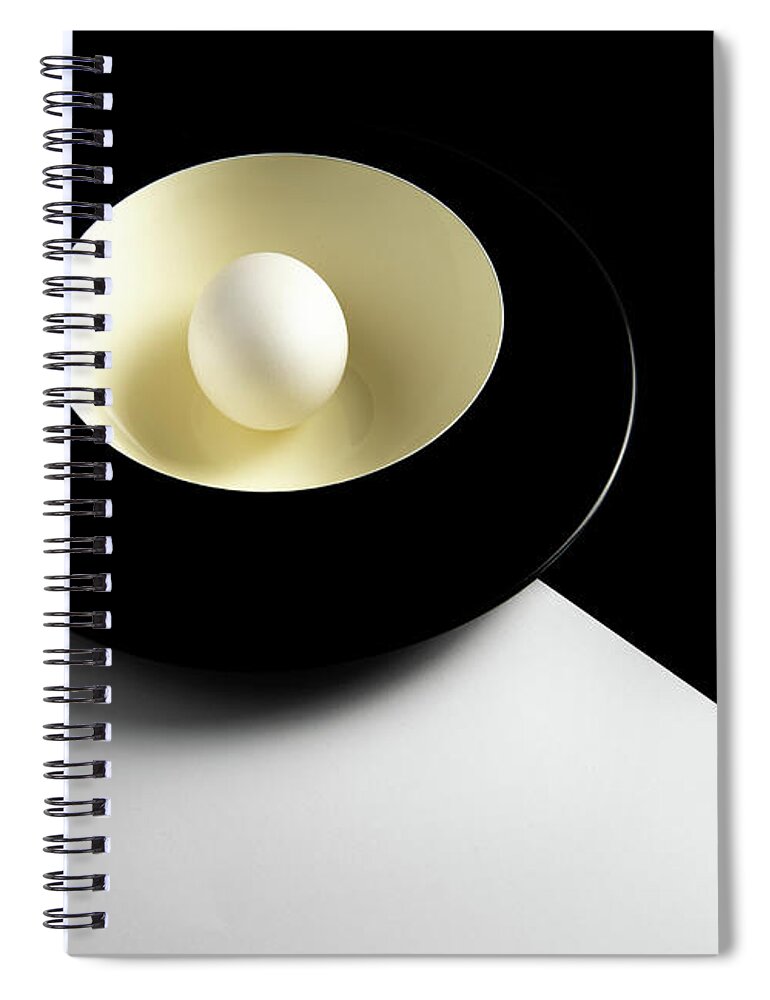Still-life Spiral Notebook featuring the photograph Single fresh white egg on a yellow bowl by Michalakis Ppalis
