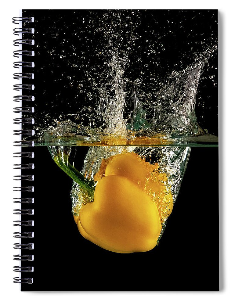 Pepper Spiral Notebook featuring the photograph Yellow bell pepper dropped and slashing on water by Michalakis Ppalis
