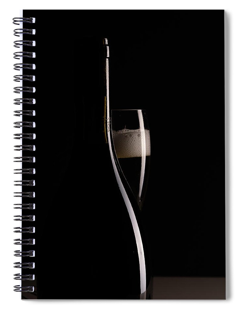 Red Wine Spiral Notebook featuring the photograph Red sparking wine on a wineglass and black wine bottle. #3 by Michalakis Ppalis