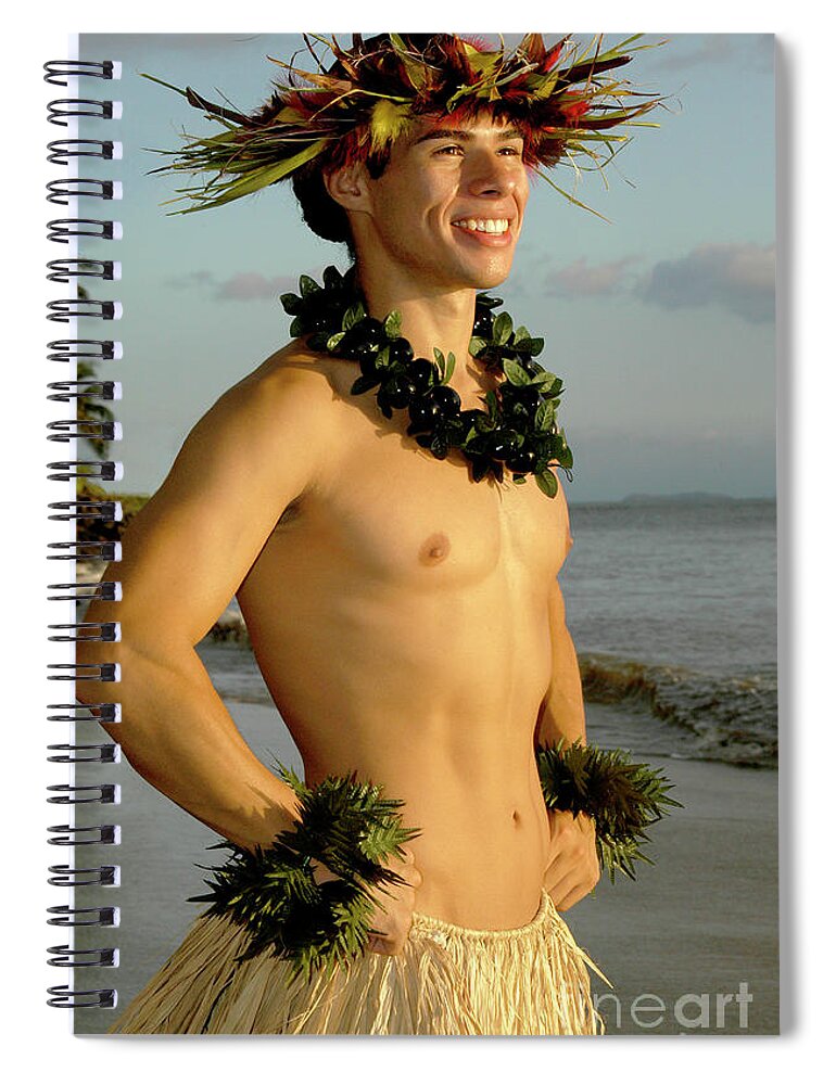 Male Hula Dancer Spiral Notebook featuring the photograph A smiling male hula dancer poses on the beach. by Gunther Allen