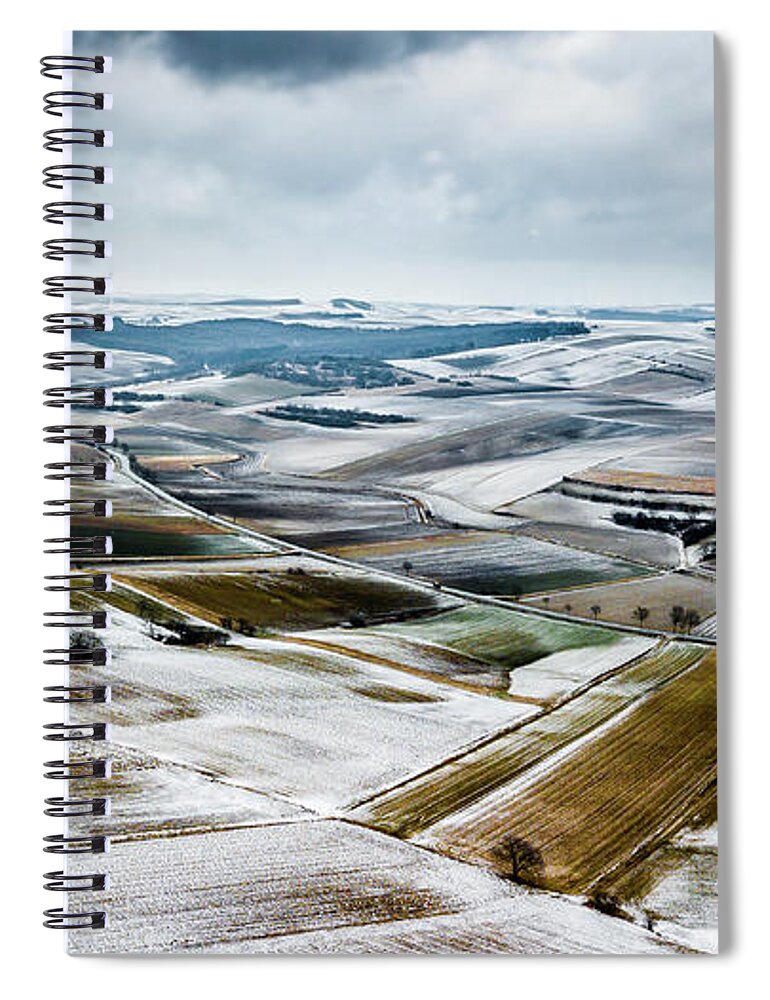 Above Spiral Notebook featuring the photograph Aerial View Of Winter Landscape With Remote Settlements And Snow Covered Fields In Austria by Andreas Berthold