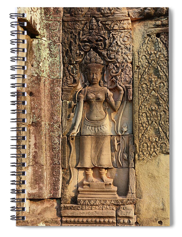 Cambodia Spiral Notebook featuring the photograph Ancient bas-reliefs on temple in Cambodia by Mikhail Kokhanchikov