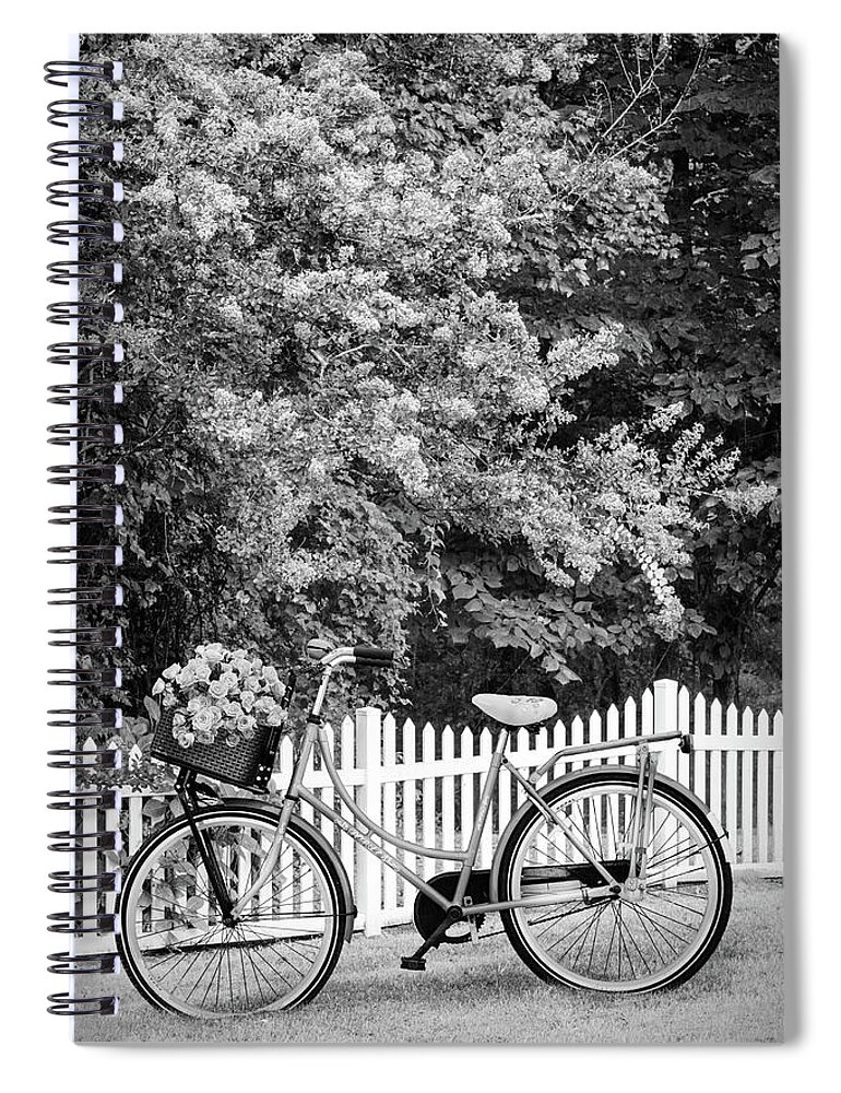 Carolina Spiral Notebook featuring the photograph Bicycle by the Garden Fence Black and White by Debra and Dave Vanderlaan