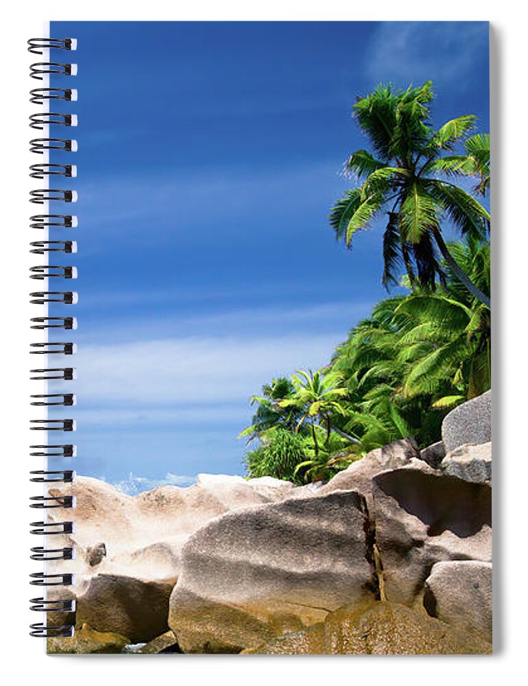 Bay Spiral Notebook featuring the photograph Coconut trees and rocks in the Seychelles by Jean-Luc Farges
