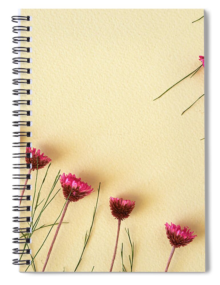 Dry Flowers Spiral Notebook featuring the photograph Dry purple floral bouquet on yellow background. Flat lay, top vi by Michalakis Ppalis