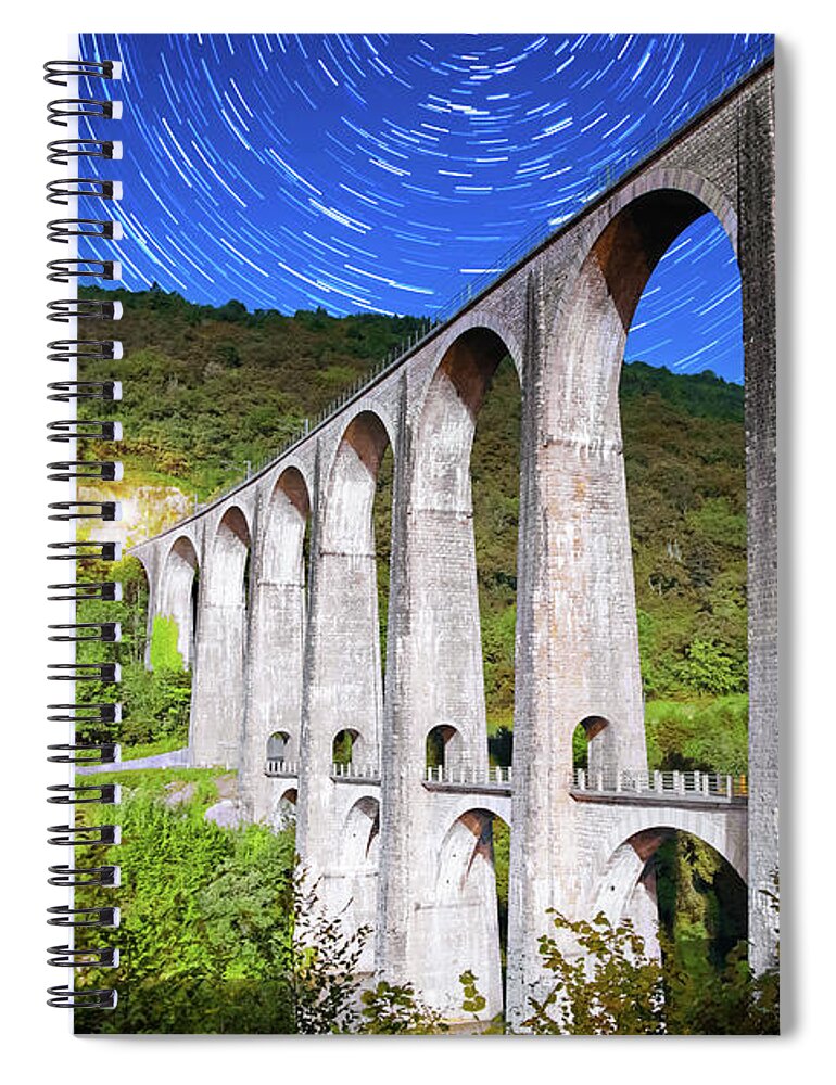 Viaduct Spiral Notebook featuring the photograph French old stone viaduct arch bridge architecture under moonlight with star trail in summer sky nigh by Gregory DUBUS