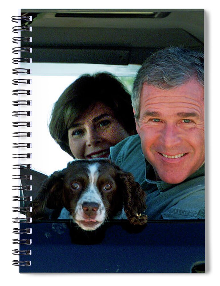 George W. Bush Spiral Notebook featuring the photograph George Bush and Laura in Truck by Rick Wilking