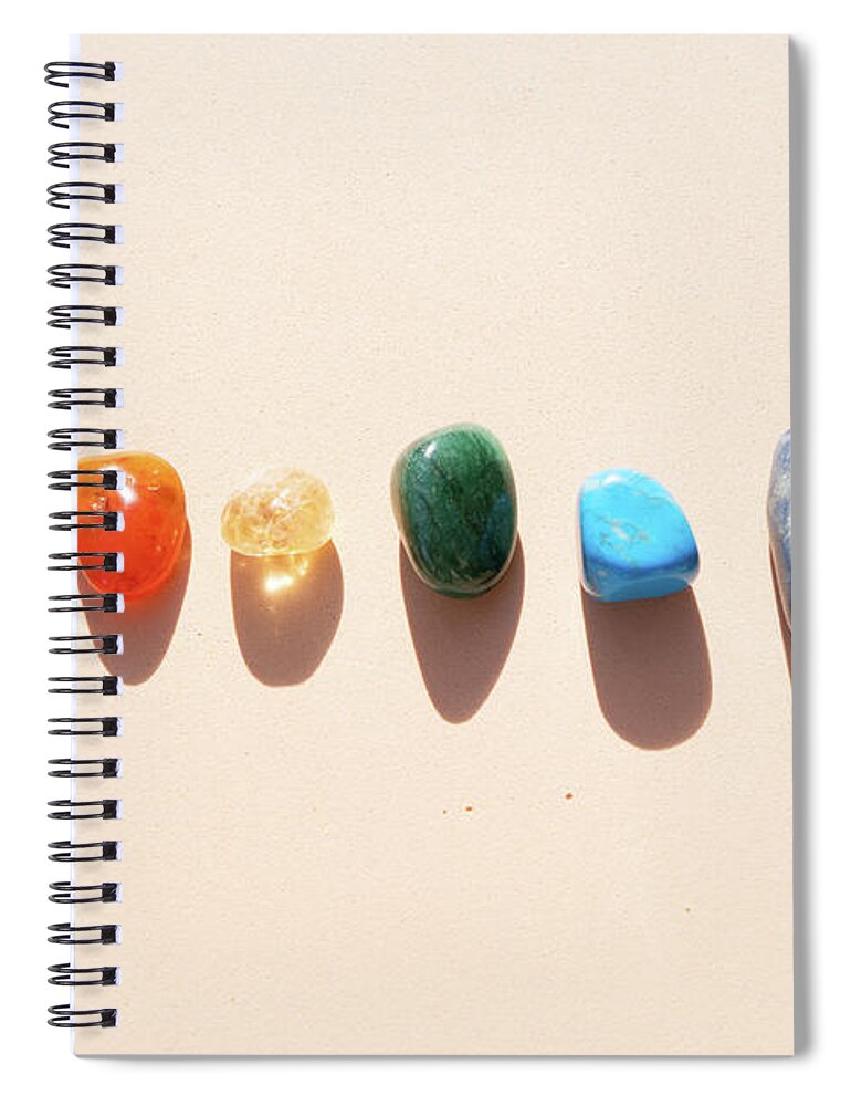 Crystal Healing Spiral Notebook featuring the photograph Healing crystals on brown background by Anastasy Yarmolovich