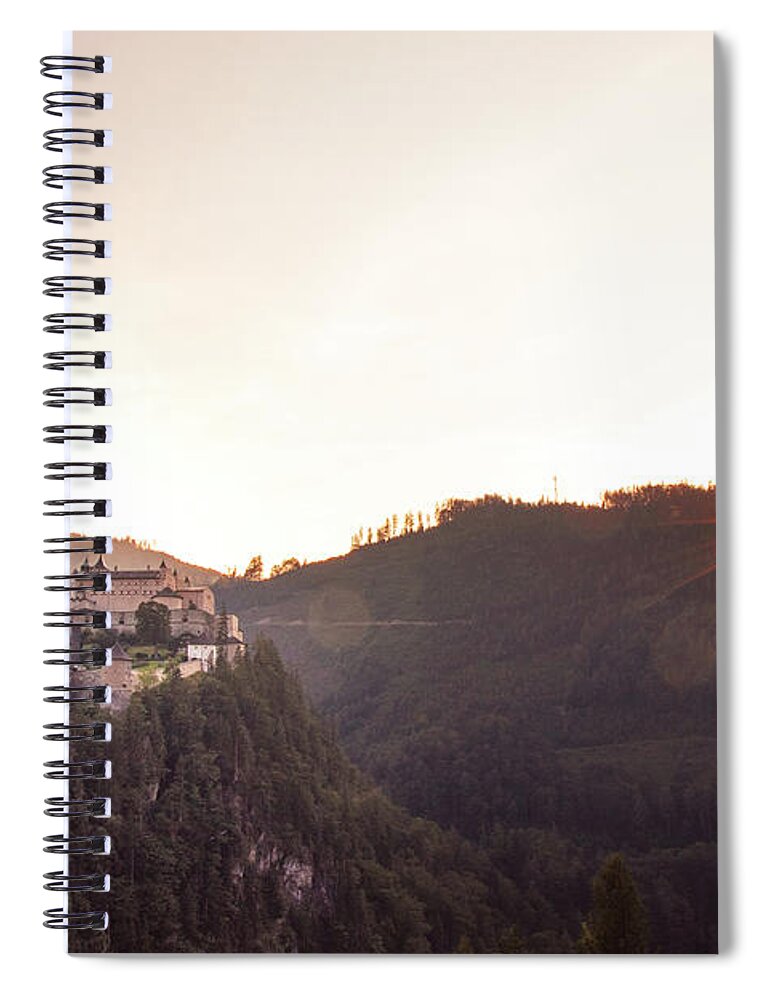 Reconstruction Spiral Notebook featuring the photograph Hohenwerfen Castle at sunset by Vaclav Sonnek