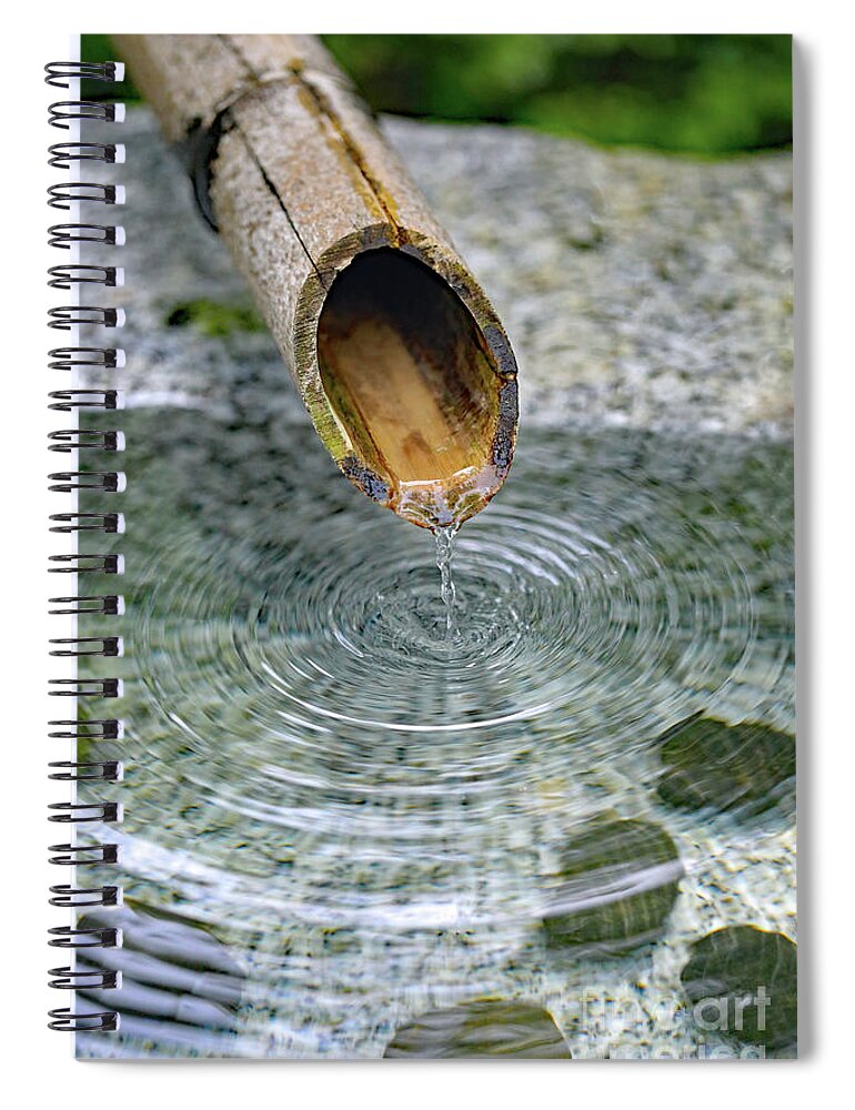 Water Fountain; Fountain; Japanese Fountain; Japanese Garden; Zen; Water; Drip; Droplets; Bamboo; Pool; Stone; Pebbles; Green; Spiral Notebook featuring the photograph In a Japanese Garden by Tina Uihlein