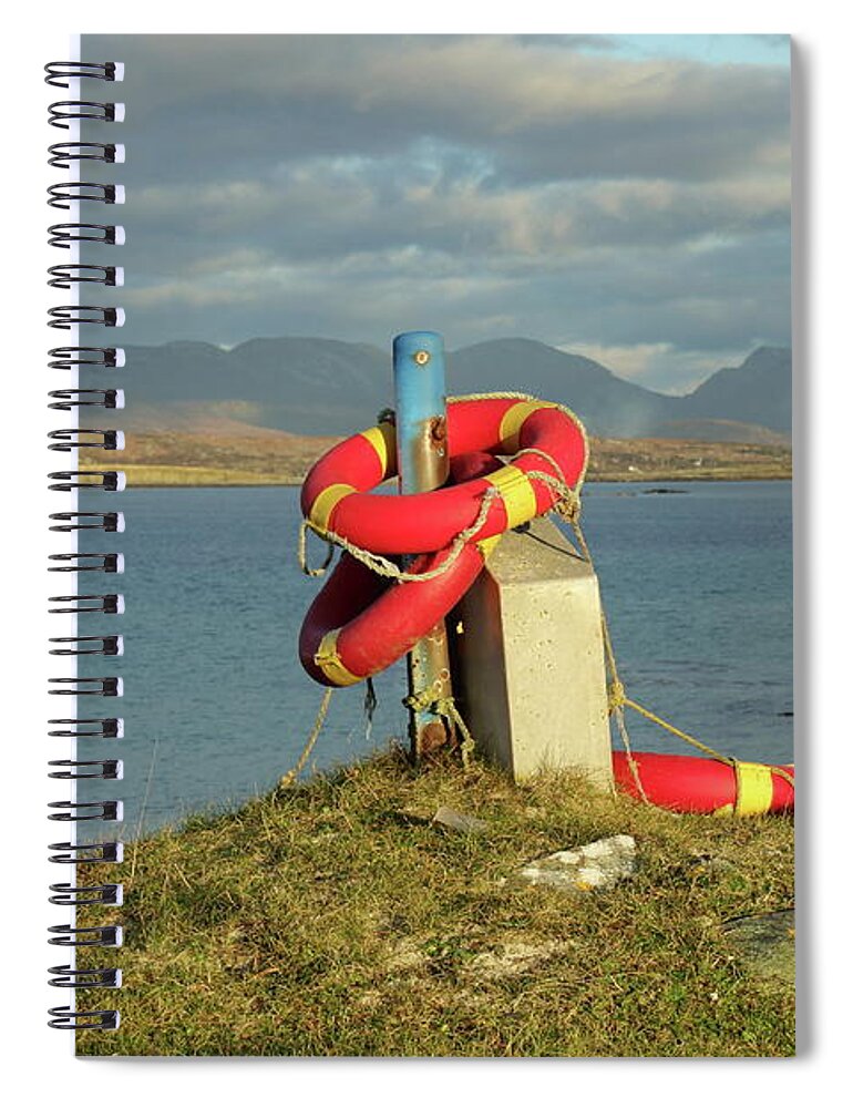 Lifebuoy Connemara Ballyconneely Galway Ireland Saftey Outdoors Ocean Mountains Beach Walking Photography Spiral Notebook featuring the photograph Life savers by Peter Skelton