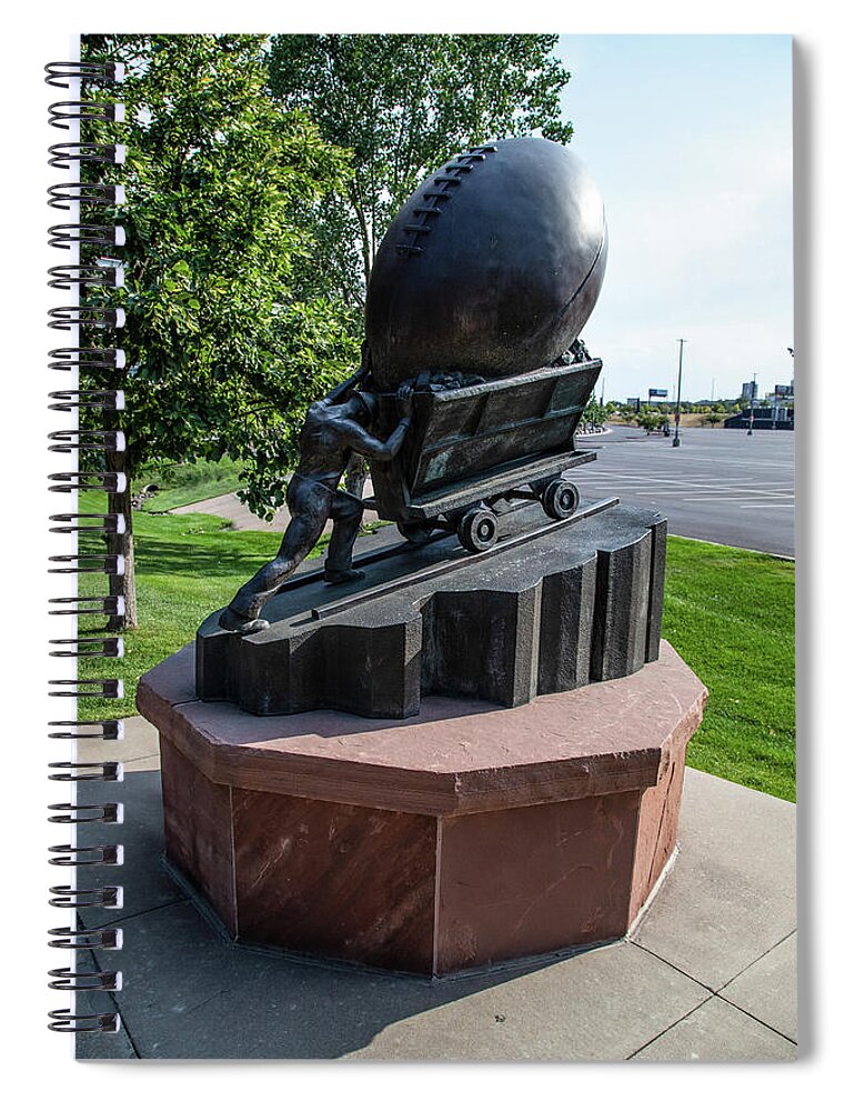 Denver Colorado Spiral Notebook featuring the photograph Mining and football statue outside Empower Field at Mile High Stadium in Denver Colorado by Eldon McGraw