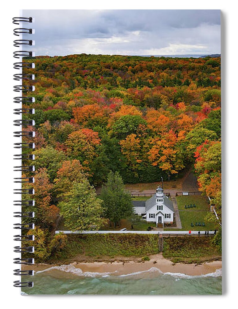 Lighthouse Spiral Notebook featuring the photograph Mission Point Lighthouse with fall colors in Traverse City Michigan by Eldon McGraw