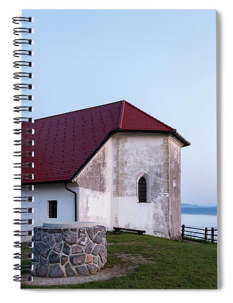 Saint Spiral Notebook featuring the photograph Morning glow over church by Ian Middleton