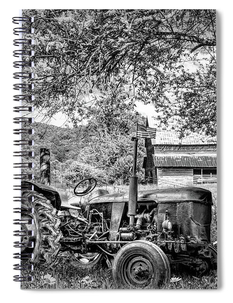 Black Spiral Notebook featuring the photograph Old Tractor in the Wildflowers Black and White by Debra and Dave Vanderlaan