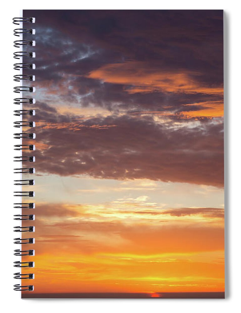 Clouds Spiral Notebook featuring the photograph Orange glowing sunrise by Adriana Mueller