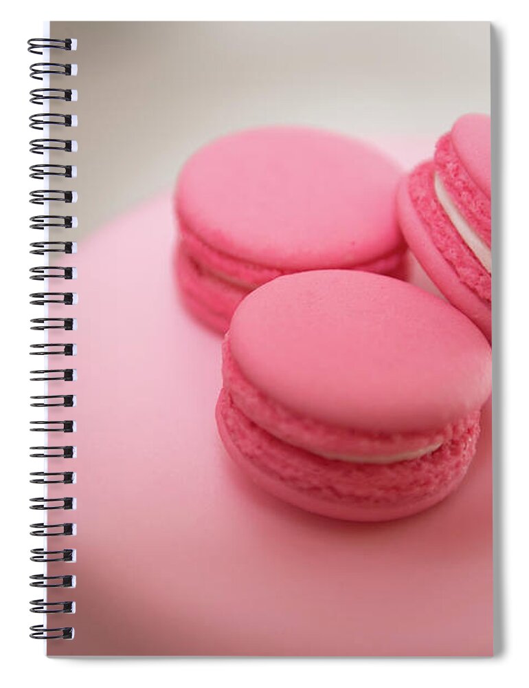 Macaroon Spiral Notebook featuring the photograph Pink color french delicious macaroons cookies. Shallow dof by Michalakis Ppalis