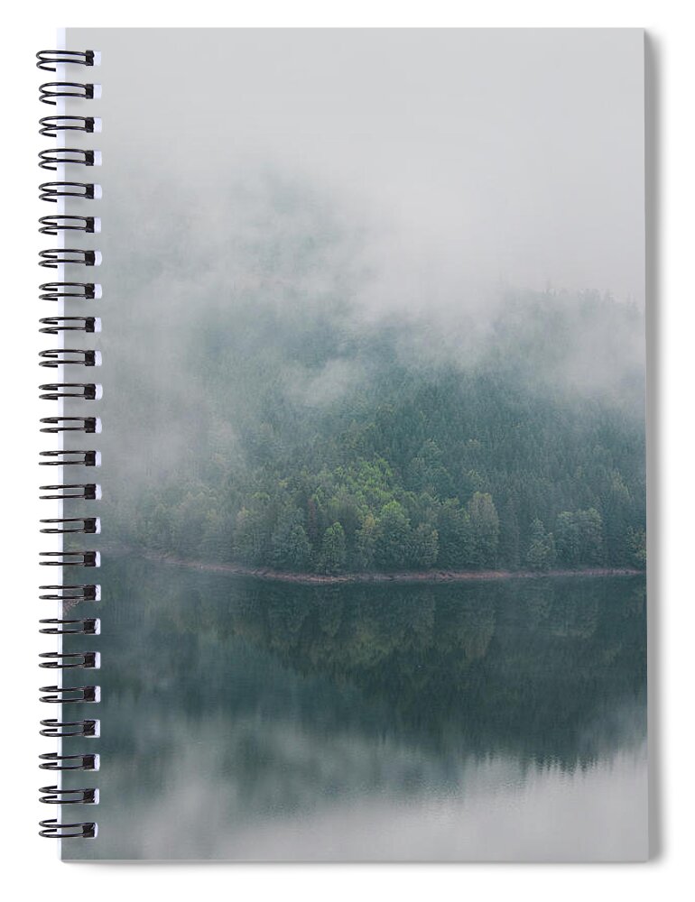 Climate Spiral Notebook featuring the photograph Rainy and foggy morning at the Sance Dam. Reflection of deciduous forest on the water surface. Autumn weather. Beskydy mountains, Czech republic. Green colour by Vaclav Sonnek