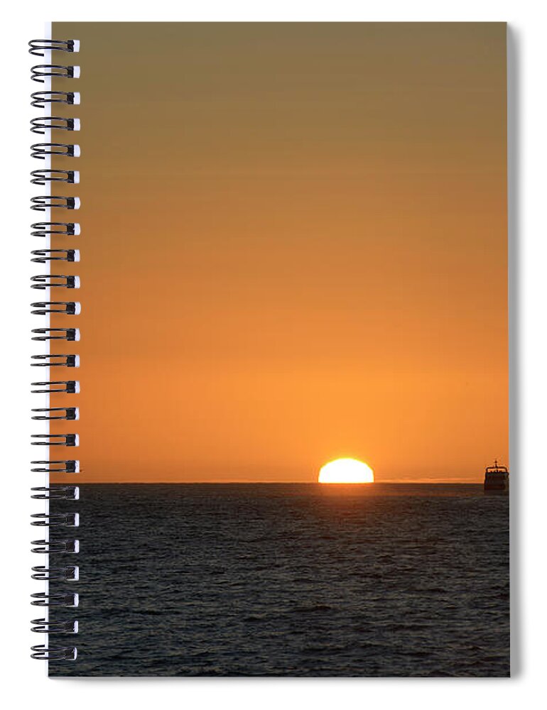 Republic Of Ecuador Spiral Notebook featuring the photograph Silhouetted boat in front of the sun, Isabela Island, Galapagos Islands, Ecuador by Kevin Oke