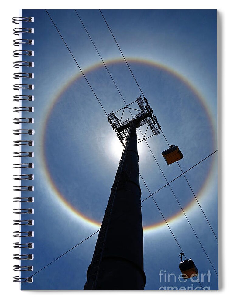 Sun Halo Spiral Notebook featuring the photograph Sun halo and cable car pylon La Paz Bolivia by James Brunker