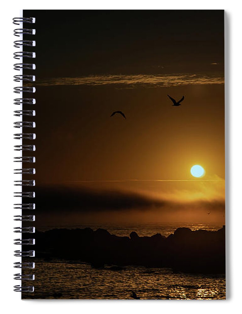 Sunset Spiral Notebook featuring the photograph Sunset over the ocean by Micah Offman