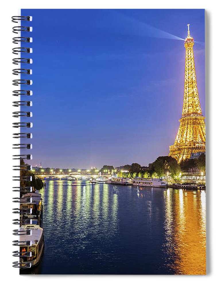 France Spiral Notebook featuring the photograph The Seine River by night in Paris, France by Fabiano Di Paolo
