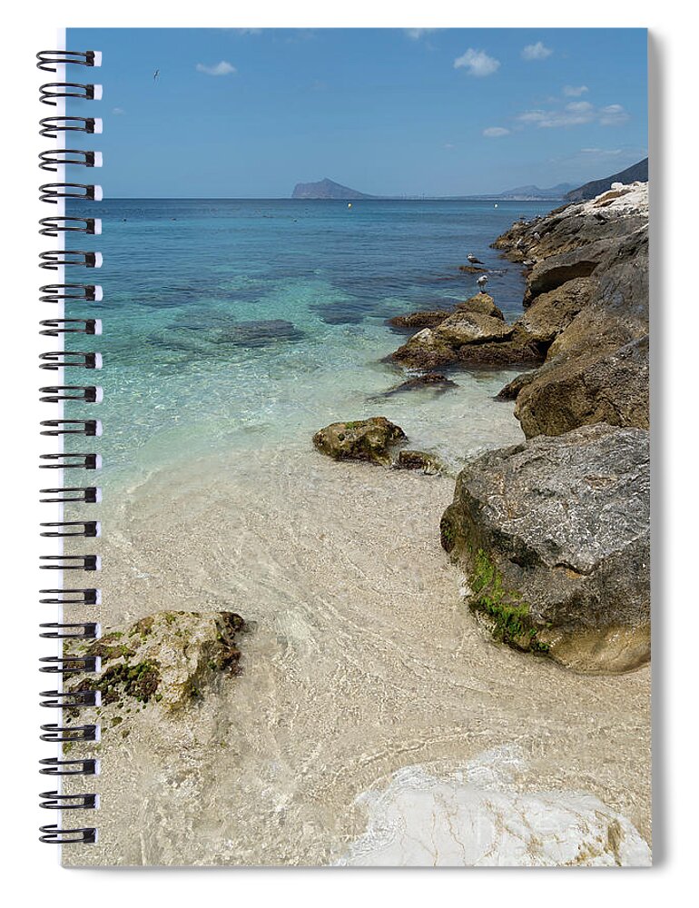 Mediterranean Spiral Notebook featuring the photograph Turquoise blue sea water and rocks in Calpe 1 by Adriana Mueller