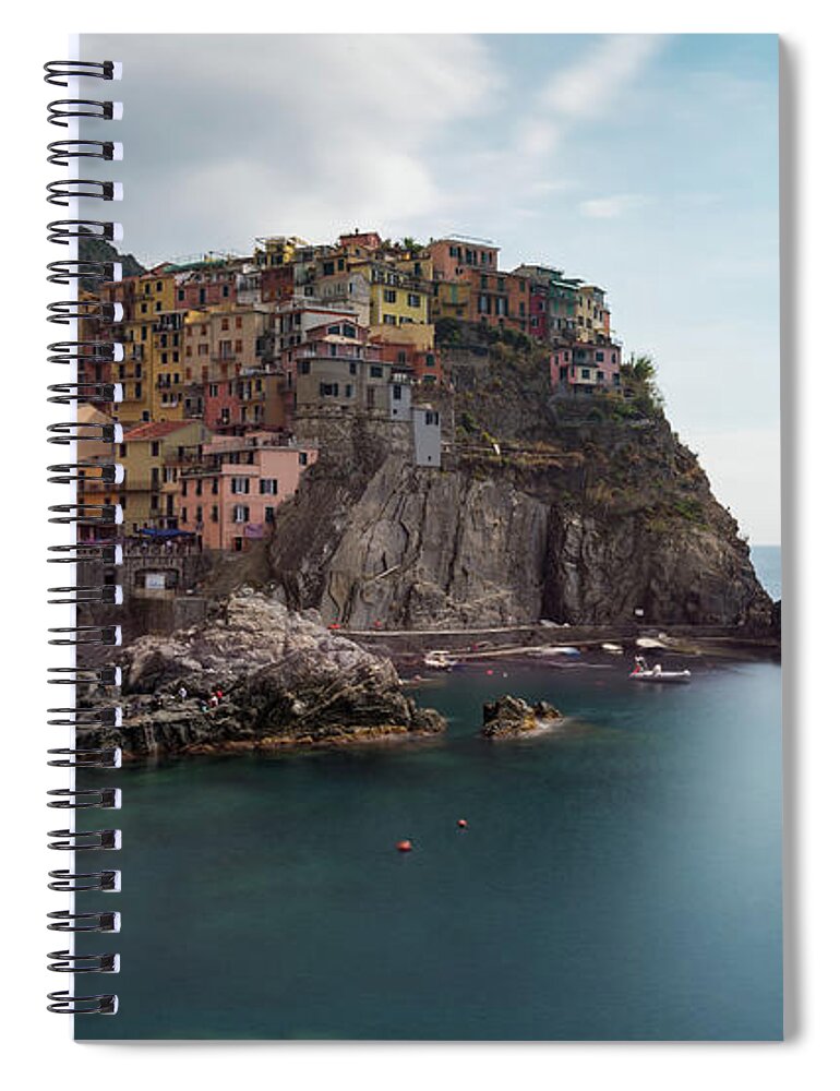 Cinque Terre Spiral Notebook featuring the photograph Village of Manarola with colourful houses at the edge of the cliff Riomaggiore, Cinque Terre, Liguria, Italy by Michalakis Ppalis