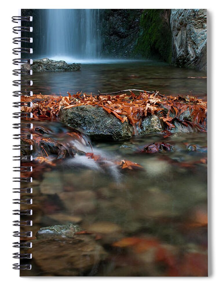 Troodos Spiral Notebook featuring the photograph Waterfall and river flowing with maple leaves on the rocks on the river in Autumn by Michalakis Ppalis