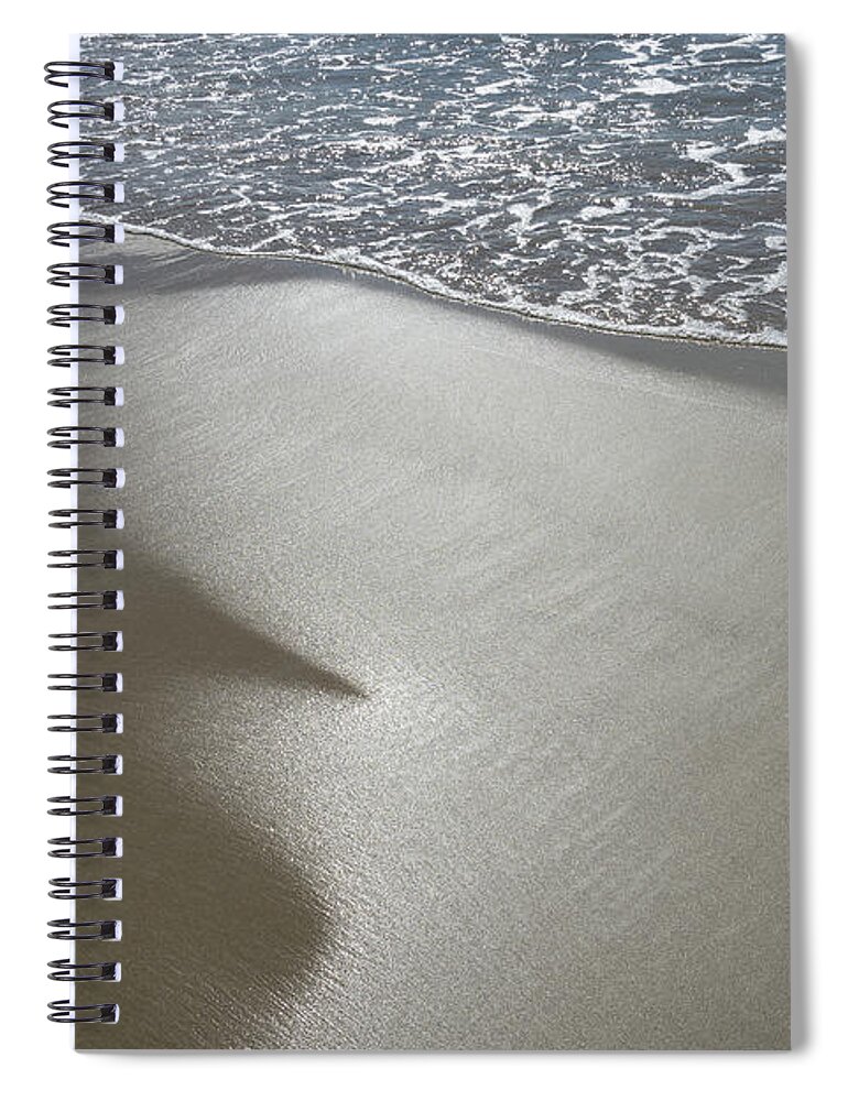 Sandy Beach Spiral Notebook featuring the photograph Wet sand, sea water and reflections of sunlight by Adriana Mueller