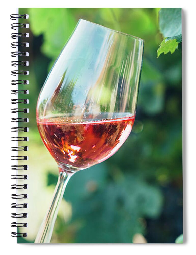 Wine Spiral Notebook featuring the photograph Wine tasting in outdoor winery. by Jelena Jovanovic