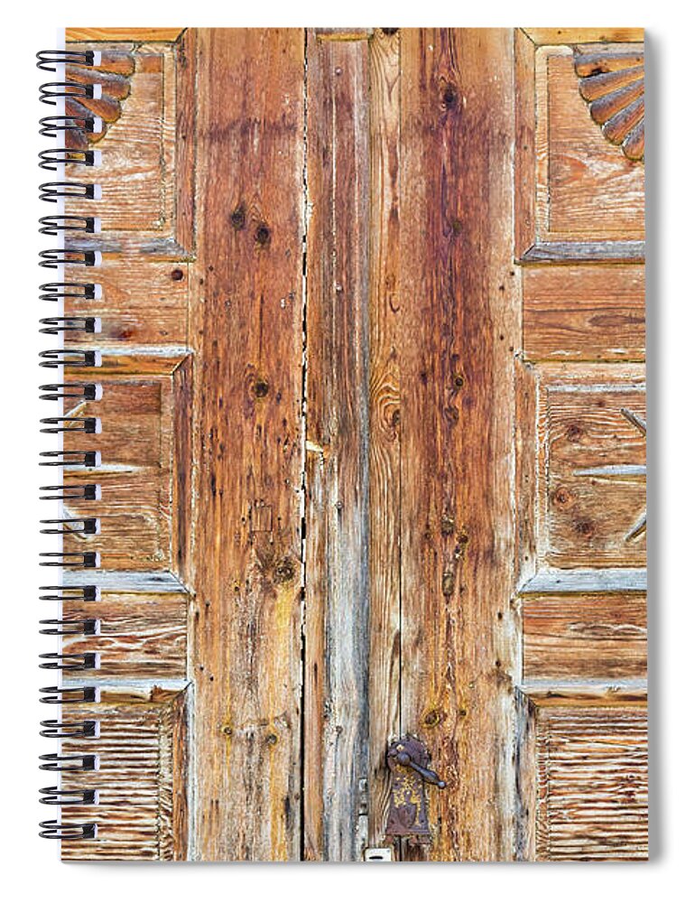 Brown Spiral Notebook featuring the photograph Patterns on wooden door by Viktor Wallon-Hars