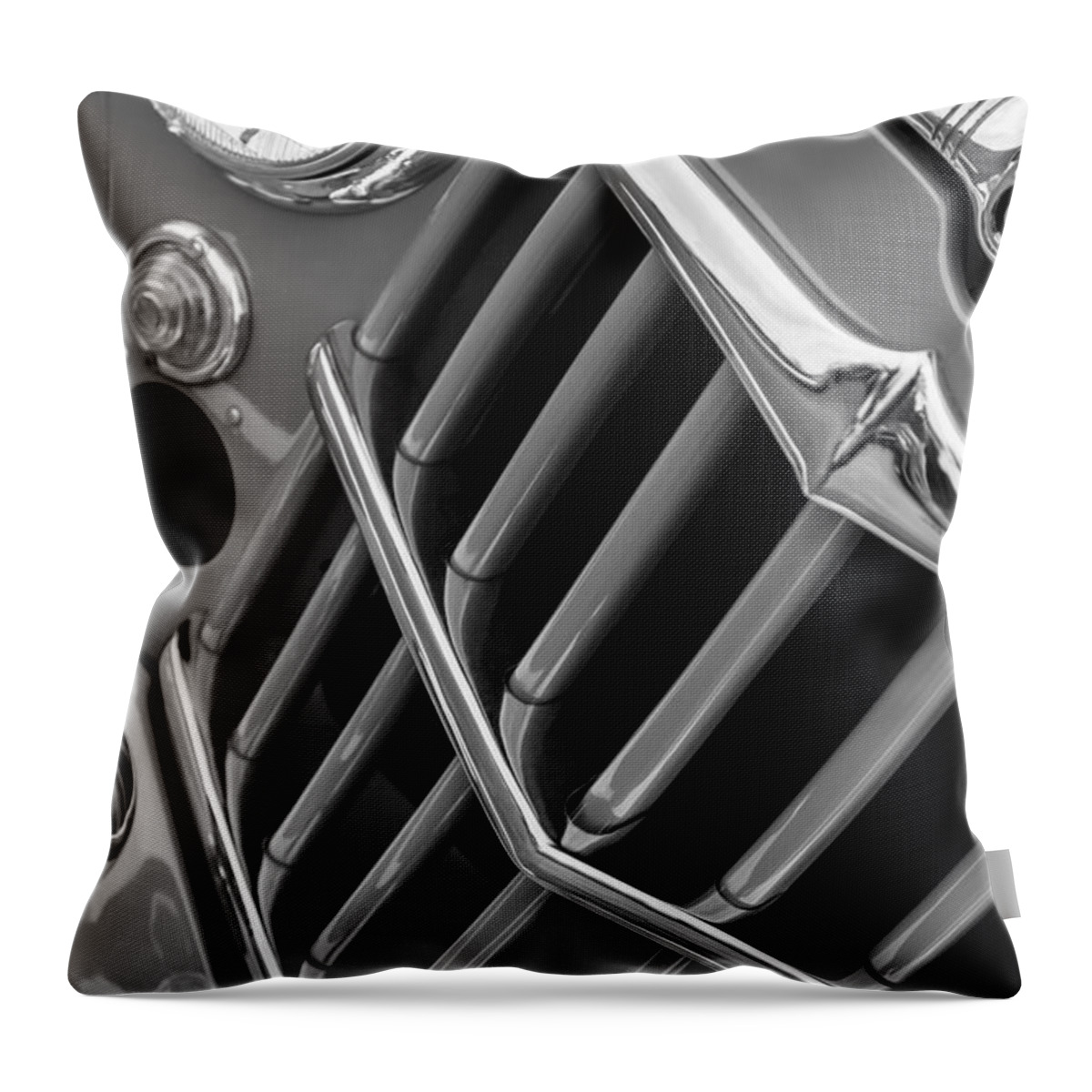 1957 Willys Jeep 6-226 Wagon Grille Emblem Throw Pillow featuring the photograph 1957 Willys Jeep 6-226 Wagon Grille Emblem by Jill Reger