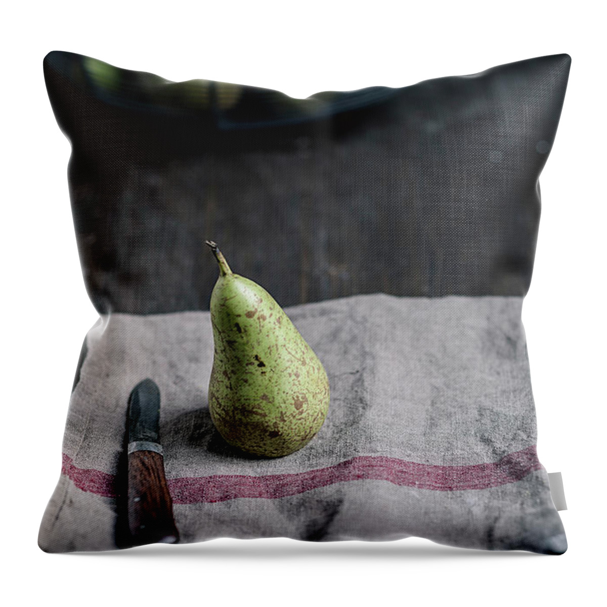 Dish Towel Throw Pillow featuring the photograph Pear With Water Trops And Knife On #1 by Westend61