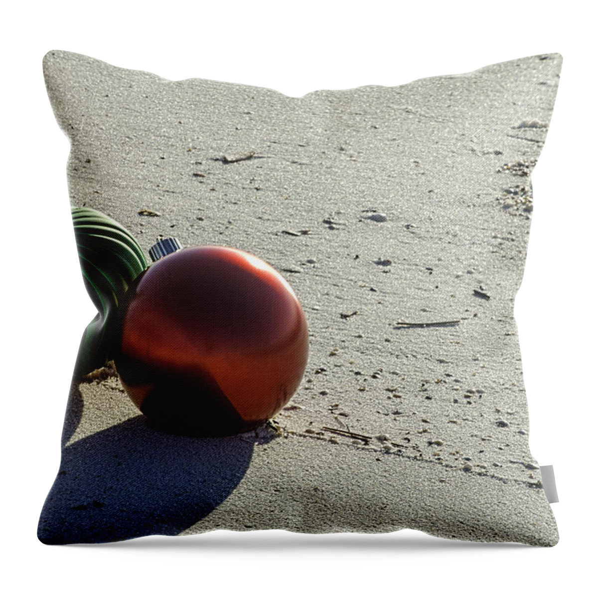 Christmas Throw Pillow featuring the digital art Red and Green Bulbs on the Beach #1 by Michael Thomas