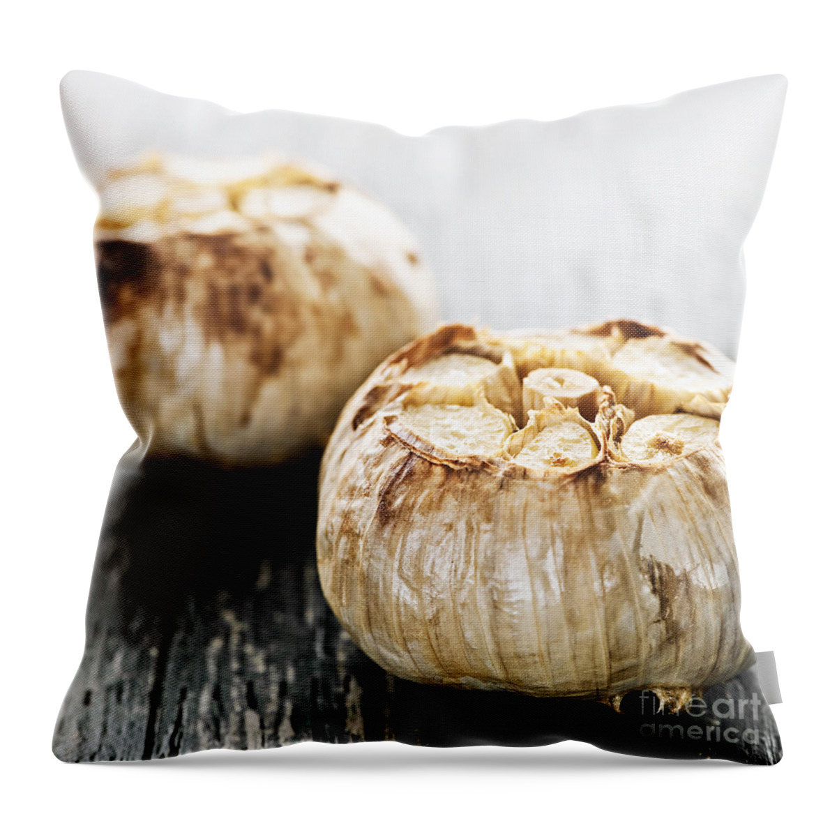 Garlic Throw Pillow featuring the photograph Roasted garlic bulbs 2 by Elena Elisseeva