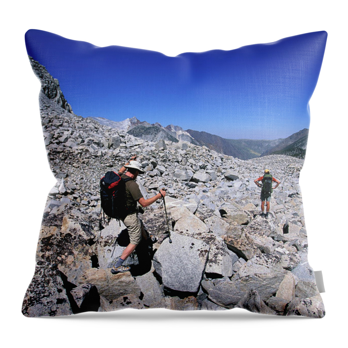 Adult Throw Pillow featuring the photograph Two Hikers In A Boulder Filled Valley #1 by Corey Rich
