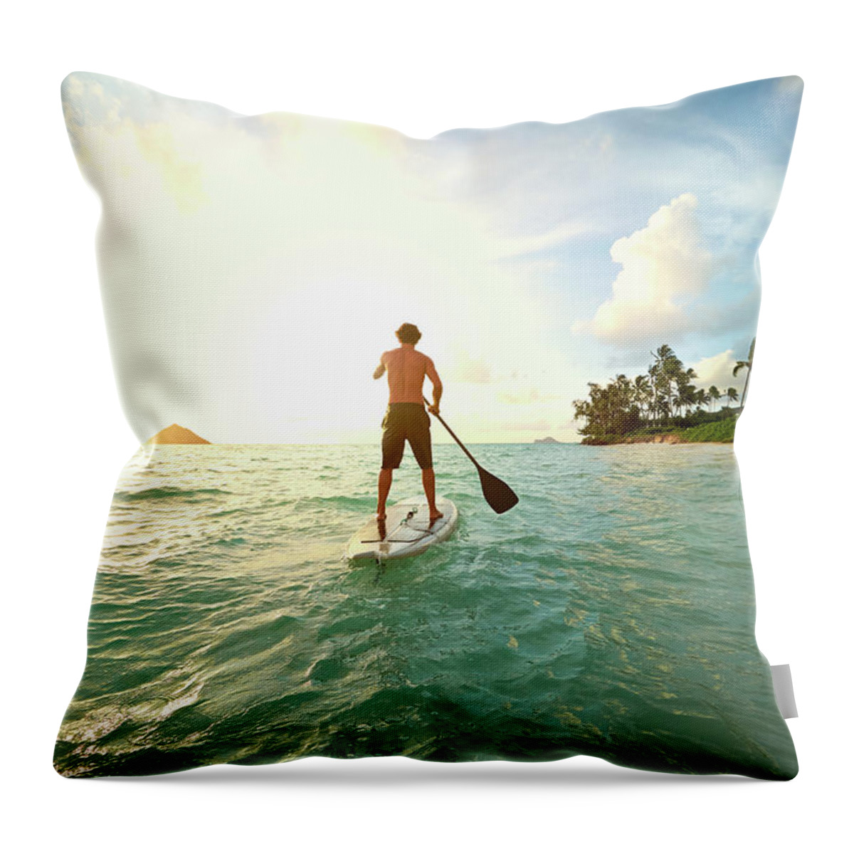 Tranquility Throw Pillow featuring the photograph Caucasian Man On Paddle Board In Ocean #2 by Colin Anderson Productions Pty Ltd