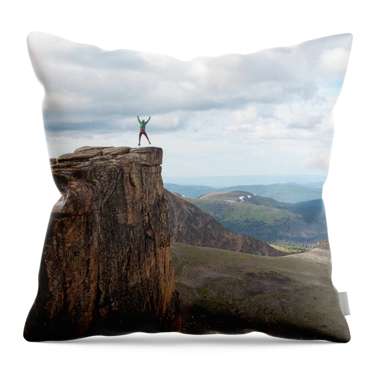 Young Women Throw Pillow featuring the photograph A Backpacker Jumps Into The Air Next by Christopher Kimmel