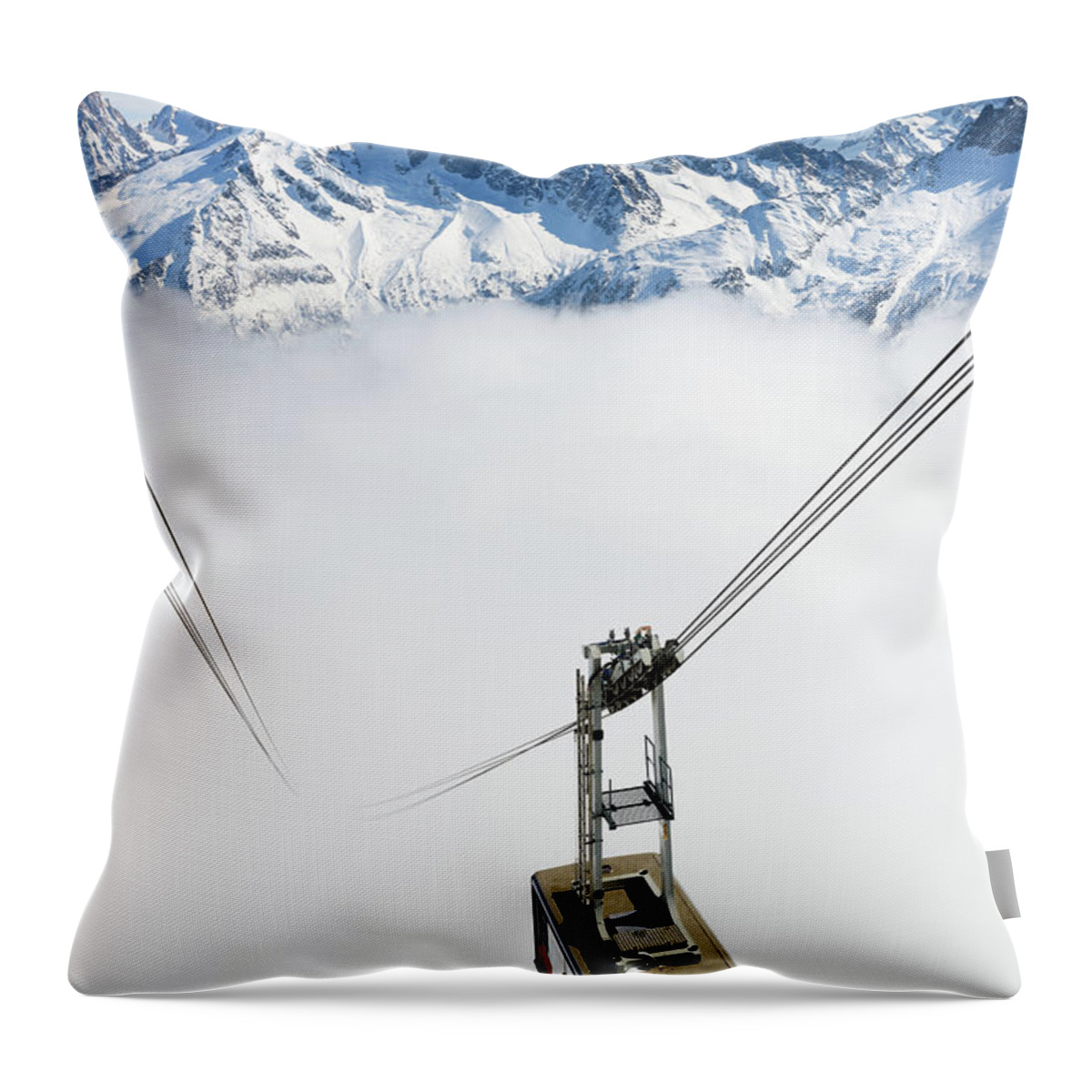 Scenics Throw Pillow featuring the photograph A Cable Car Traveling Up A Snowy by Alexsava