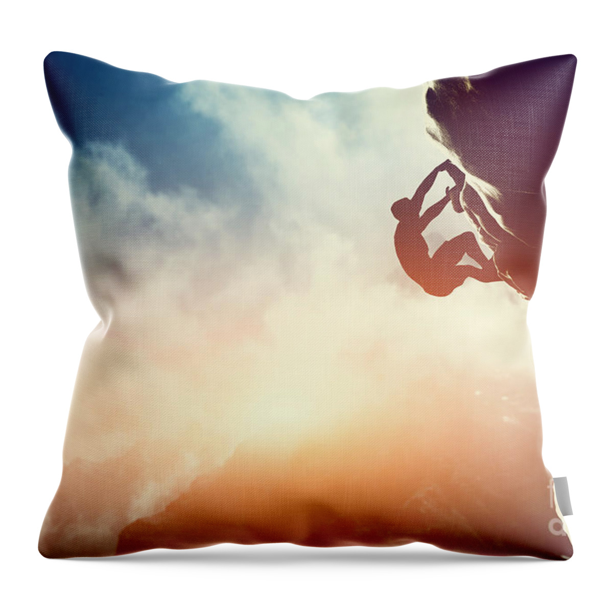 Climb Throw Pillow featuring the photograph A silhouette of man climbing on rock mountain by Michal Bednarek