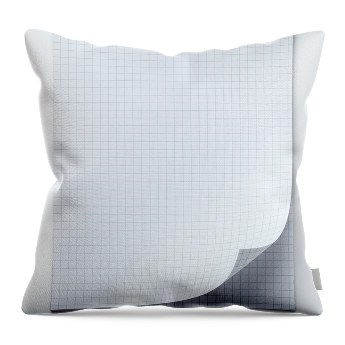 Shadow Throw Pillow featuring the photograph A Spiral Notepad With Graph Paper And A by Caspar Benson
