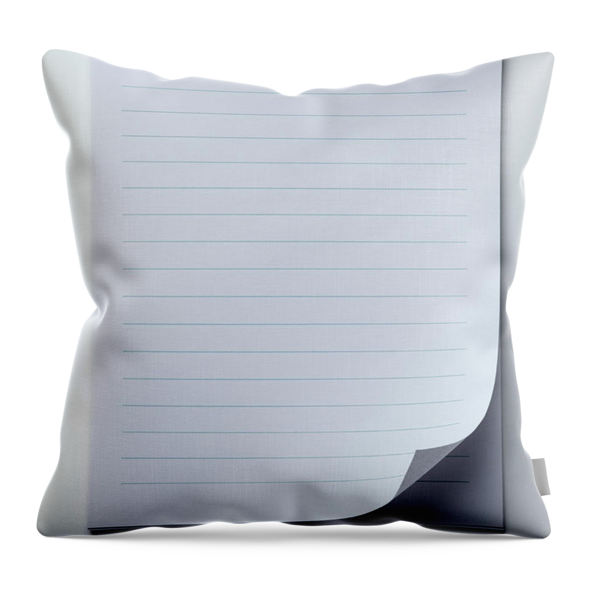 Shadow Throw Pillow featuring the photograph A Spiral Notepad With Lined Paper And A by Caspar Benson