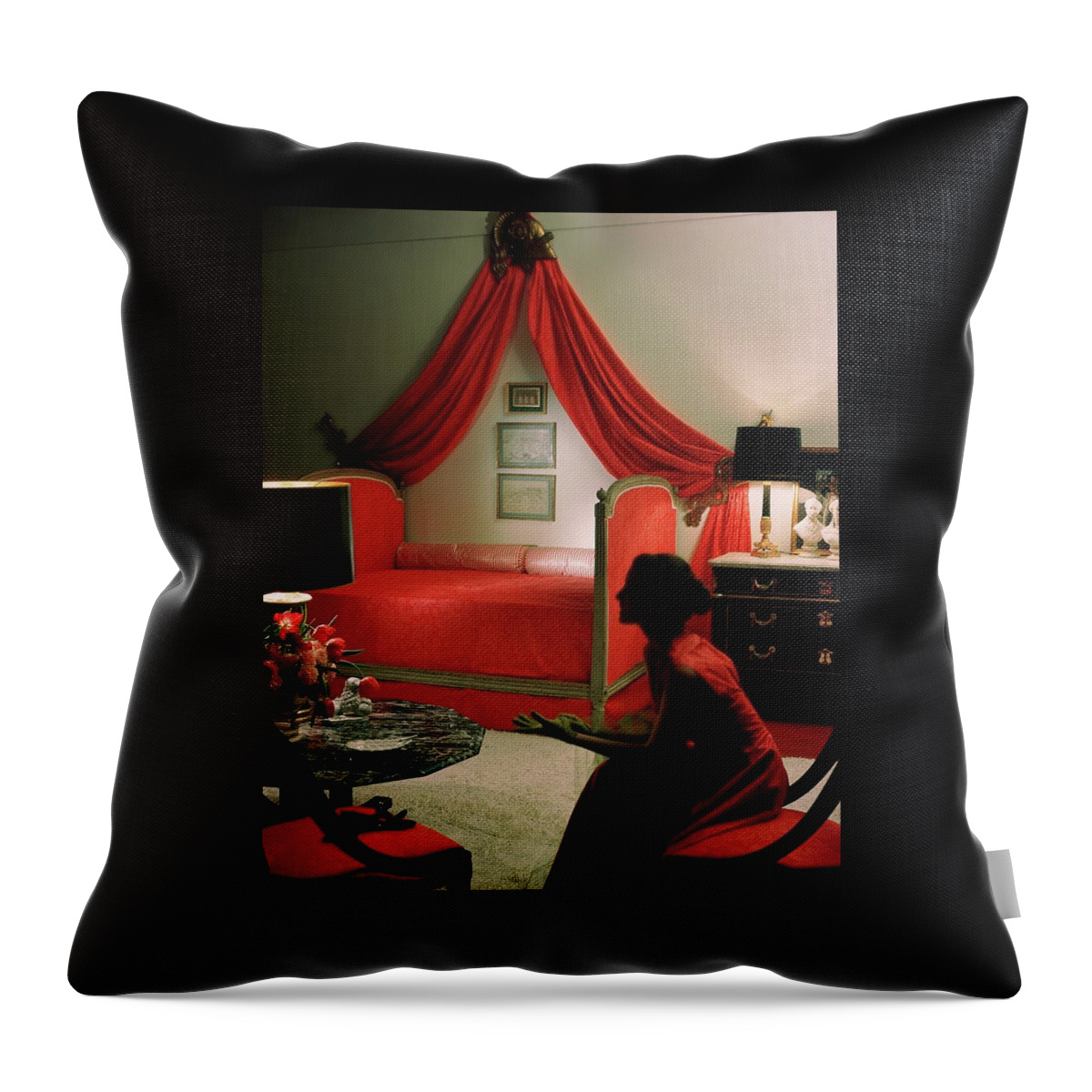 A Young Woman Sitting In A Red Bedroom Throw Pillow