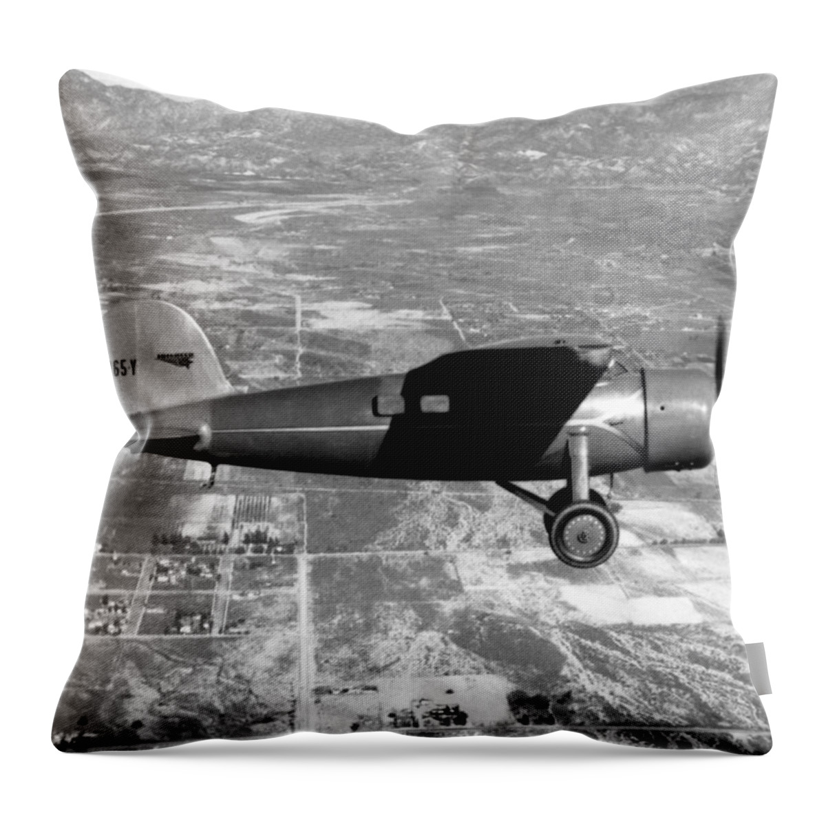 1934 Throw Pillow featuring the photograph Amelia Earhart in her plane by Underwood Archives