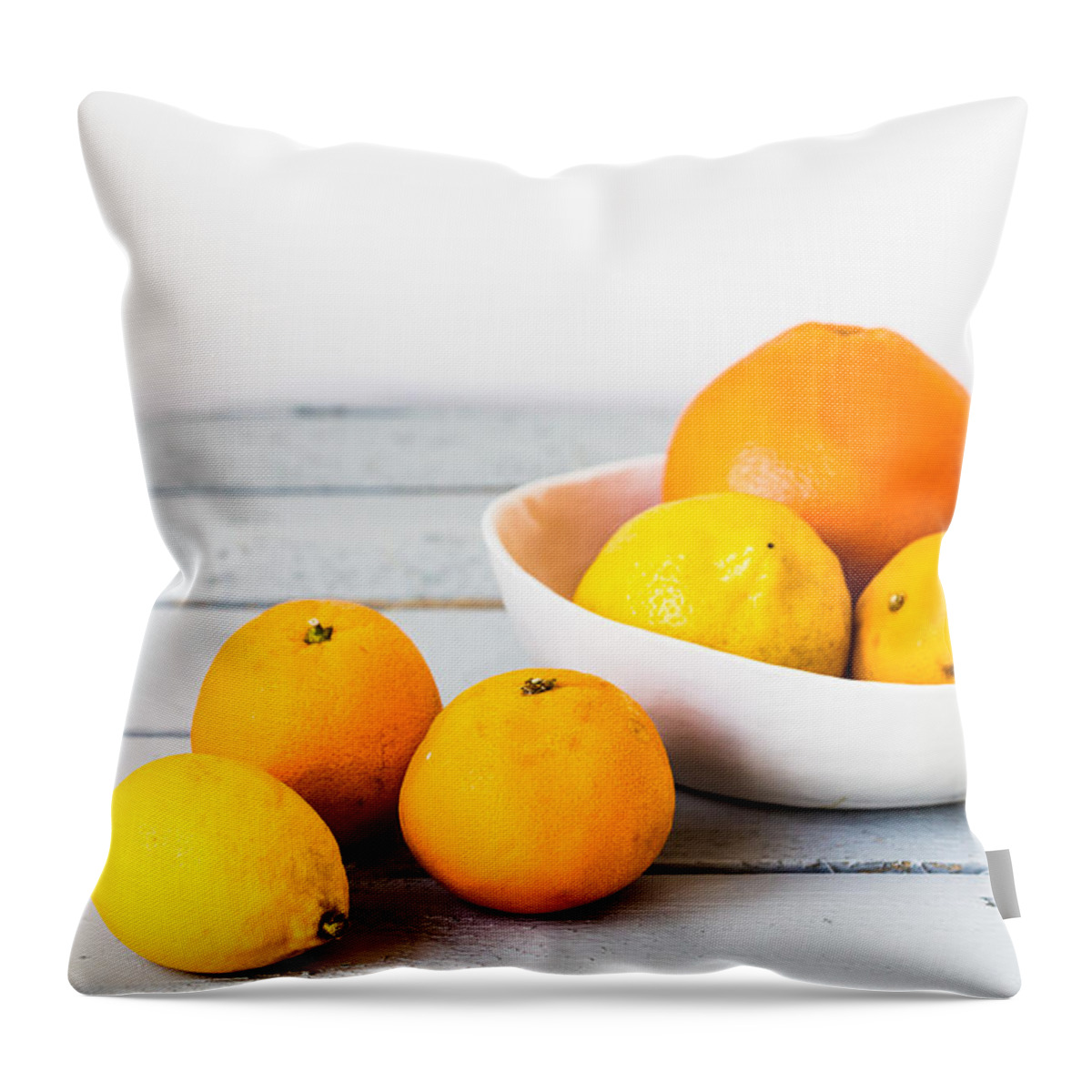 Citrus Fruit Throw Pillow featuring the photograph Assorted Citrus Fruits by Philippe Garo