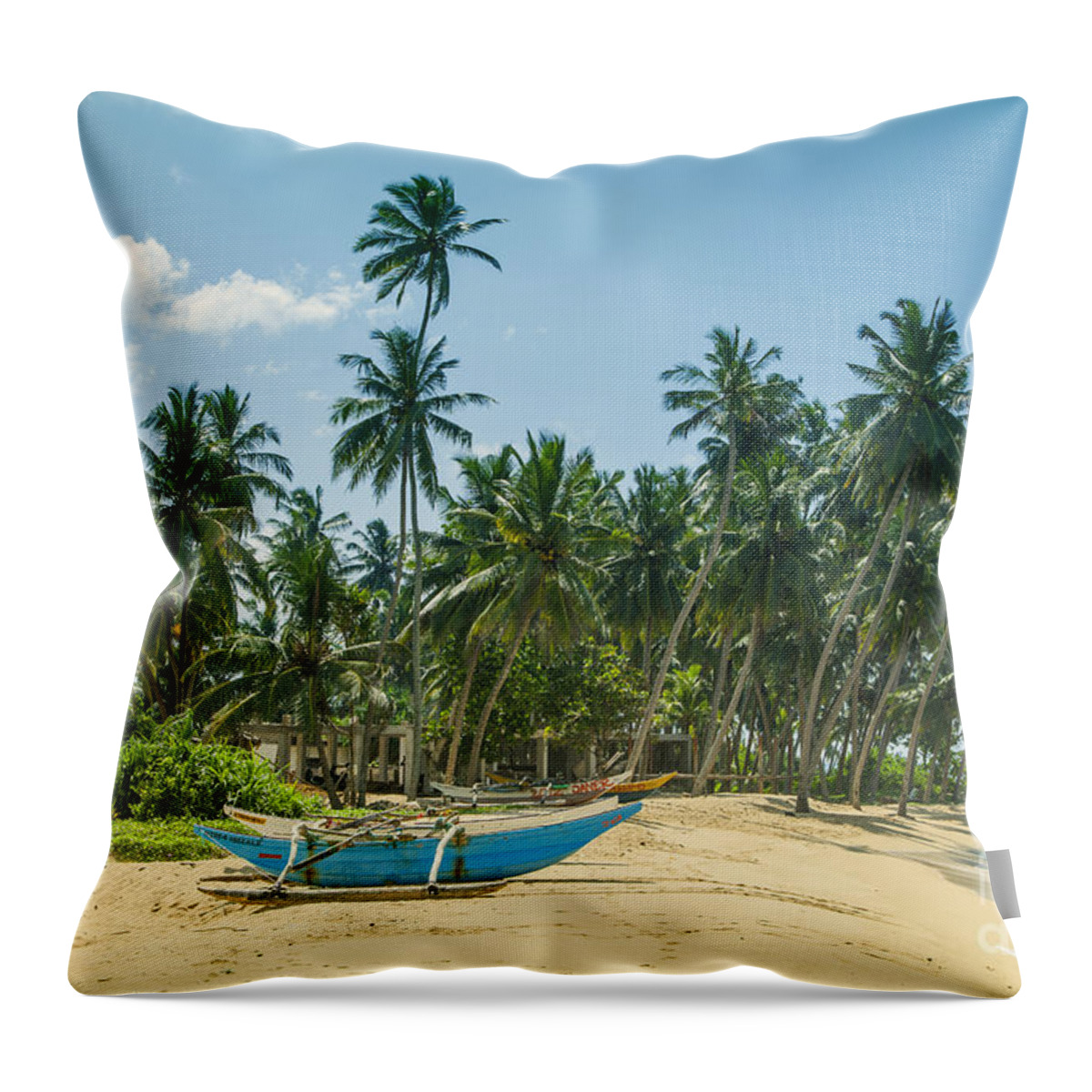 Catamaran Throw Pillow featuring the photograph Blue Catamaran at a beach with coconut palm trees by Gina Koch