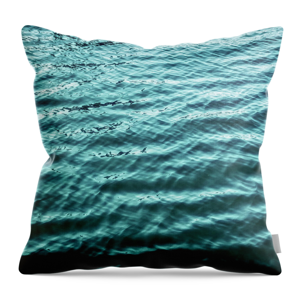 Shadow Throw Pillow featuring the photograph Blue Water Surface With Smooth Wave by Assalve