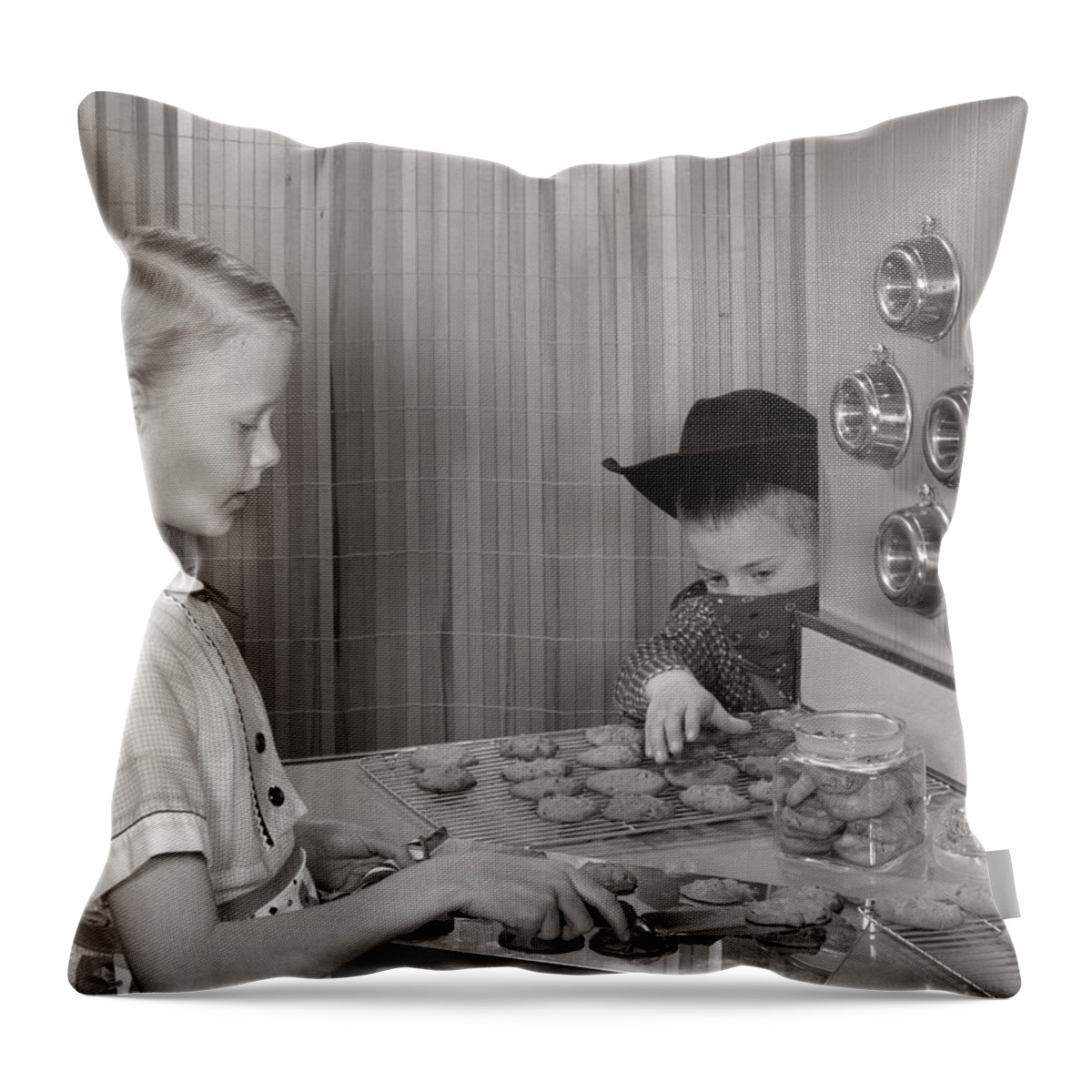 1960s Throw Pillow featuring the photograph Brother Stealing Sisters Cookies by L. Fritz/ClassicStock
