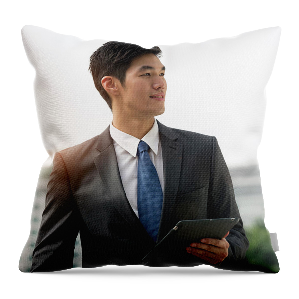 Young Men Throw Pillow featuring the photograph Businessman Holding Digital Tablet by Eternity In An Instant